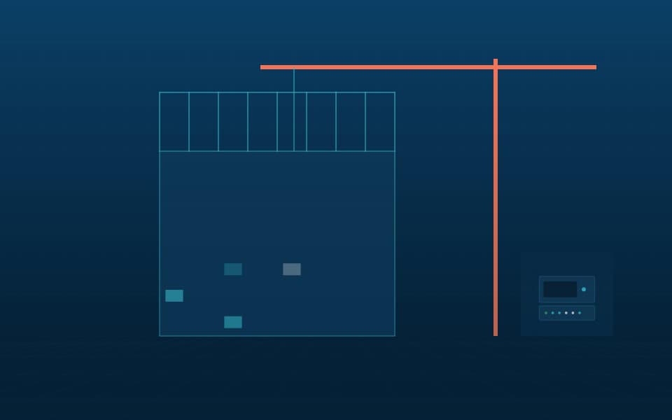 Building under construction with a site cabinet, at night