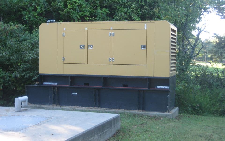 A standby diesel generator set in a sound-attenuated enclosure